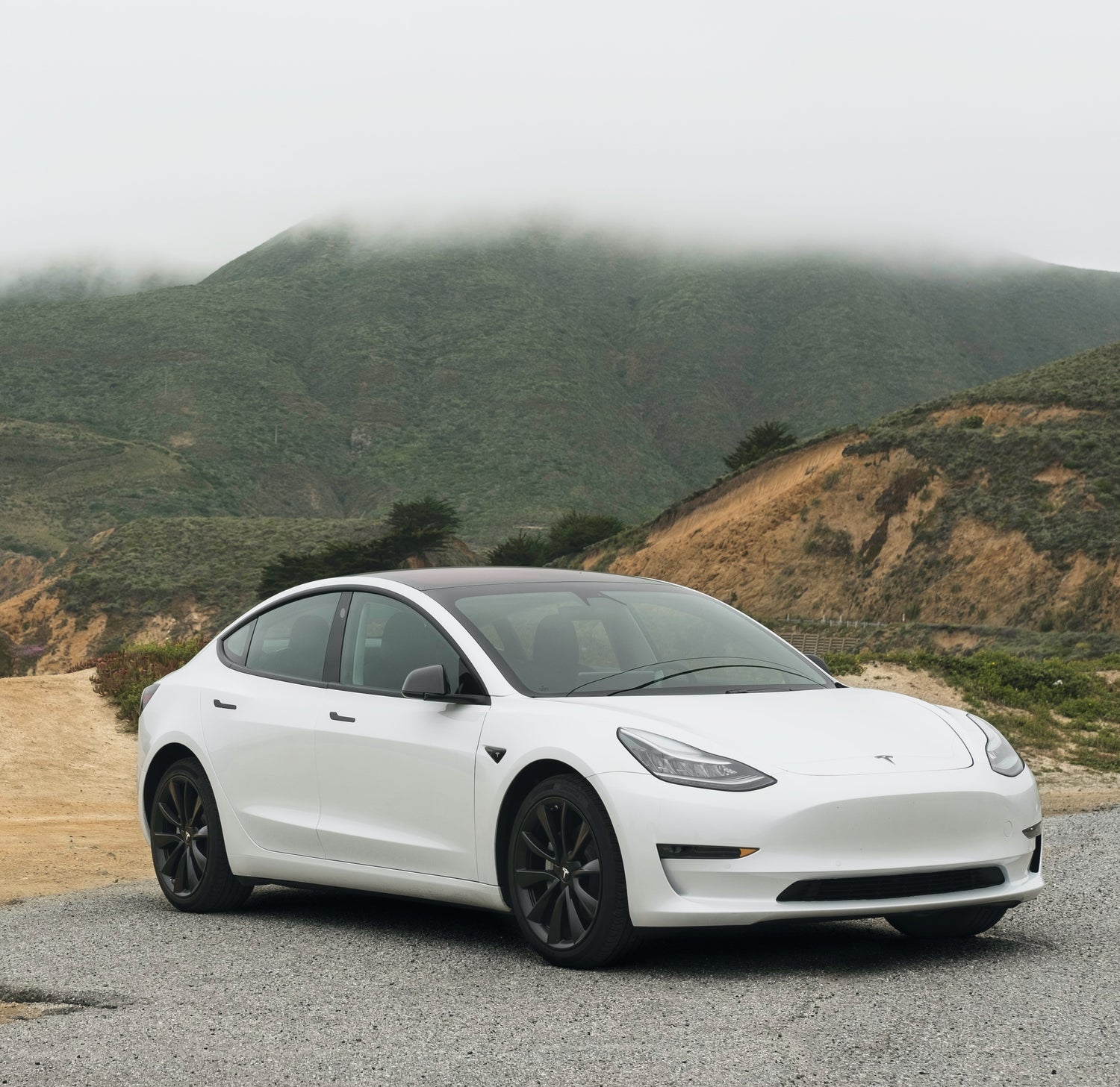 A white Tesla Model 3.